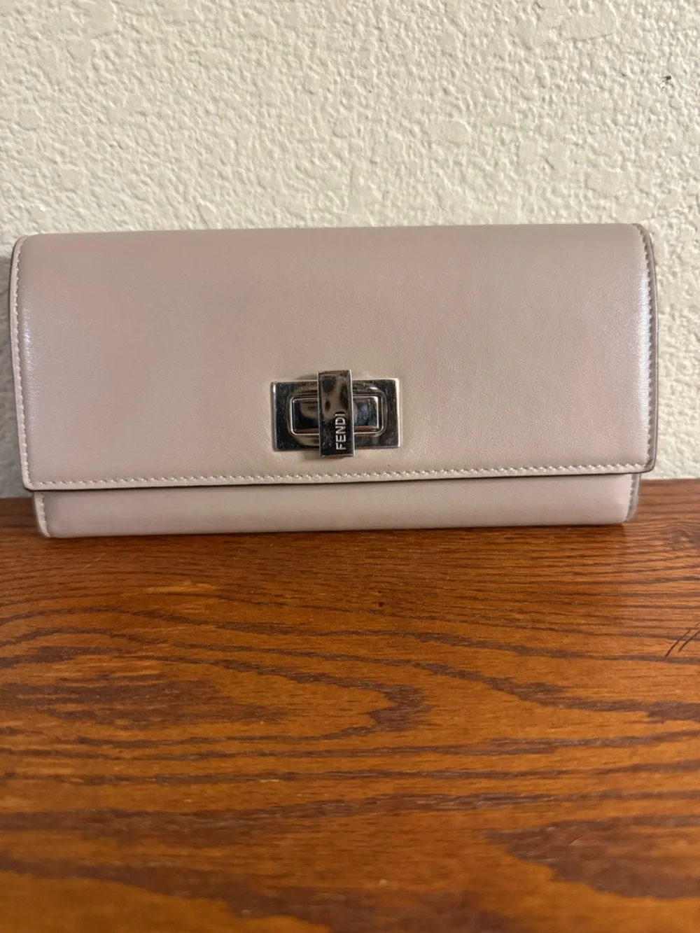 Fendi Authentic Peekaboo Calfskin Leather Clutch Wallet in Taupe